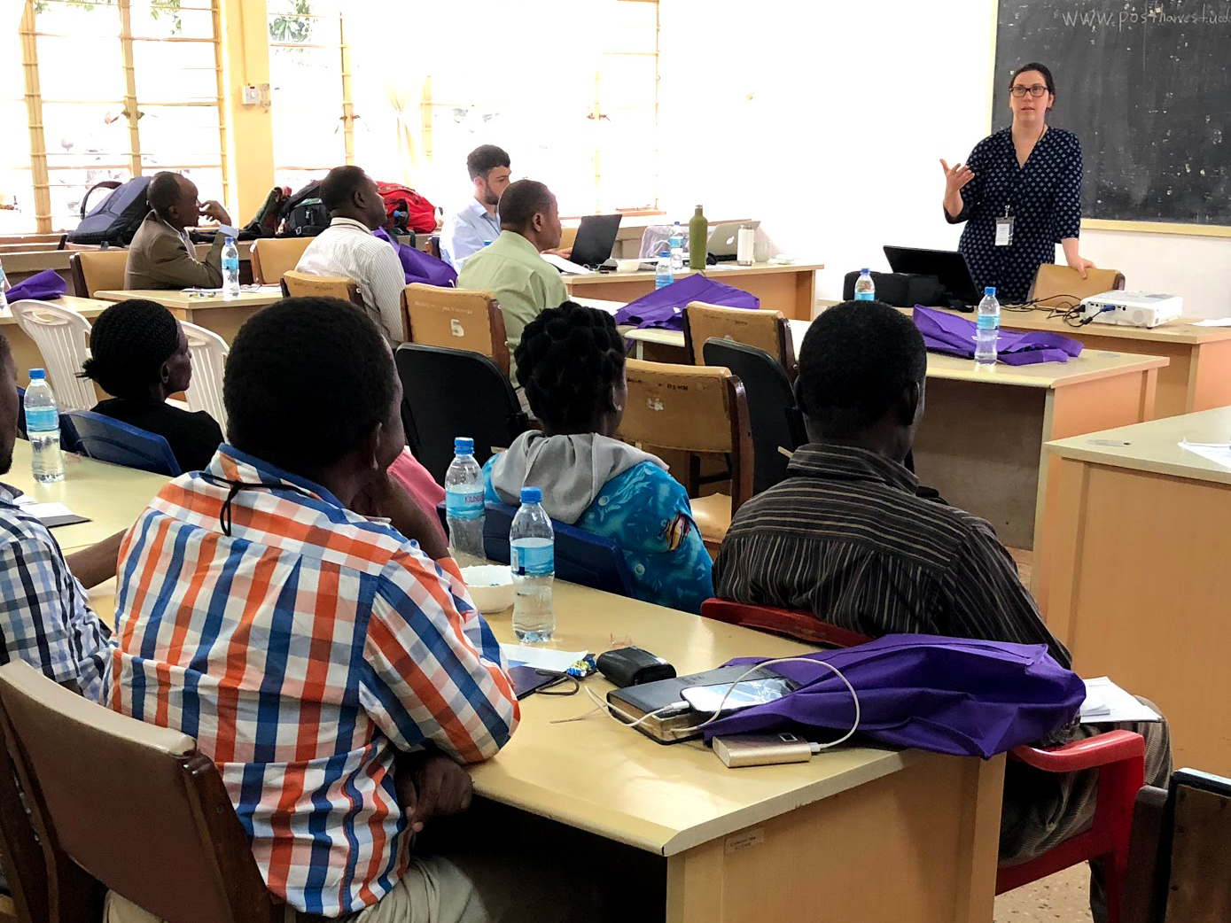 University classroom with students and speaker