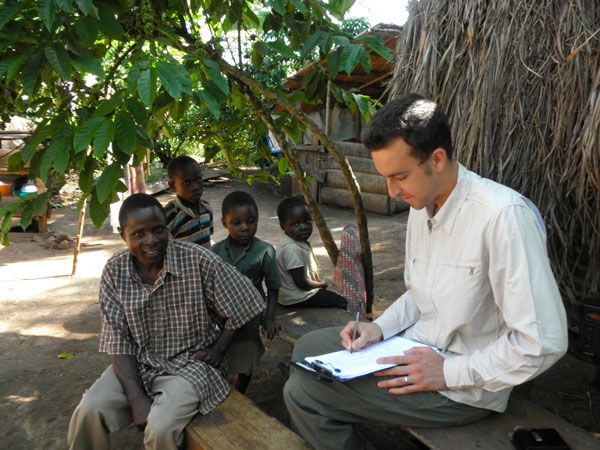 Sean Kearney, then a UC Davis graduate student, interviews farmers in Uganda for a project with Dr. Kate Scow during the Horticulture Innovation Lab’s first five years.