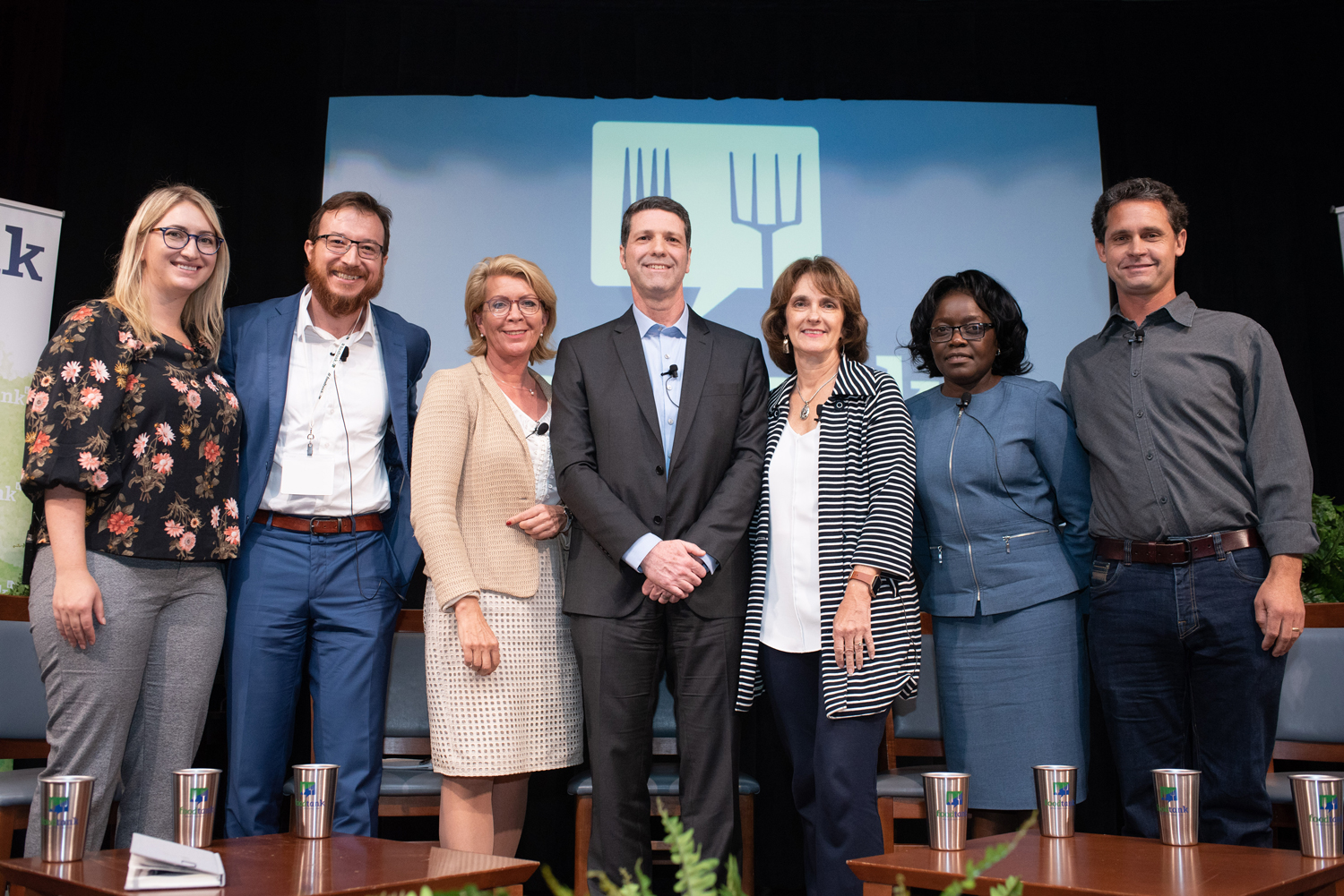 Panel group photo on Food Tank Summit stage