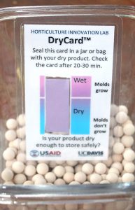 DryCard with color strip with color scale and directions for use. Horticulture Innovation Lab product marked with USAID and UC Davis logos