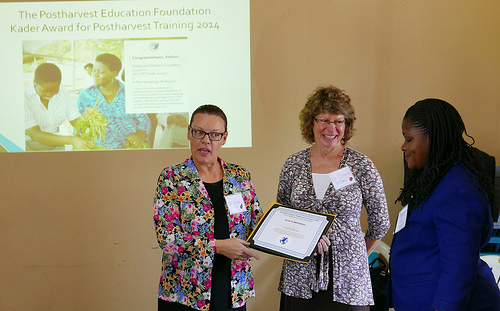 women present award to scientist