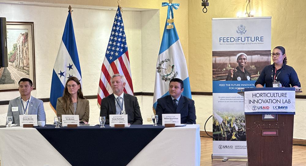 USAID Guatemala Mission, Project Management Specialist, Economic Growth Office, Gerson Morales; Horticulture Innovation Lab Director, Dr. Erin J. Mcguire; Zamorano University President, Sergio Rodríguez Royo; William Alexander Oliva Pichiya representing Minister Maynor Estrada from the Ministry of Agricultural Development of Guatemala; and Celia Odila Trejo Ramos, Head of the Department of Agriculture Science and Production at podium. Photo: Heather Hayashi.