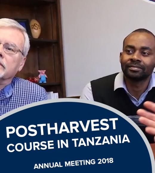 "Postharvest course in tanzania, annual meeting 2018" text over Majubwa and colleague looking at a computer