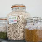 Drying beads in airtight jars keep vegetable seeds dry (includes sticker with logos for USAID and HortCRSP)